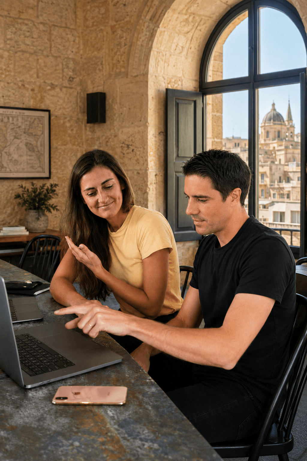 Two women laughing at work